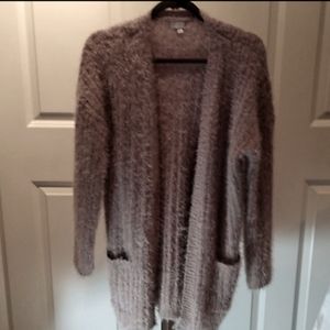 Long cardigan that is so soft and fluffy in a taupe color.